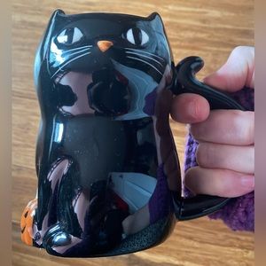 Black kitty cat with pumpkin and tail for handle - shaped mug